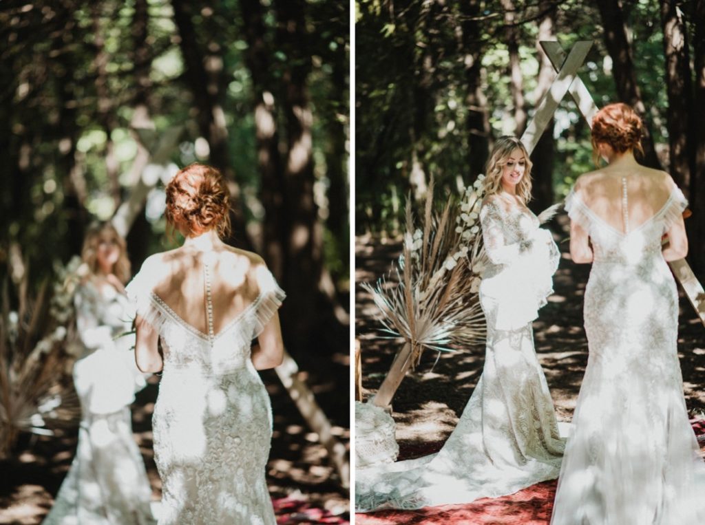 lesbian couple in forest wedding ceremony