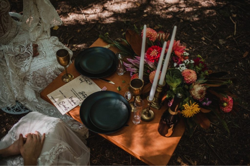 intimate table for two at forest wedding