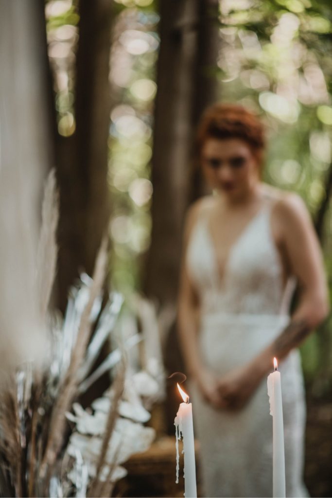 redhead bride in forest wedding ceremony