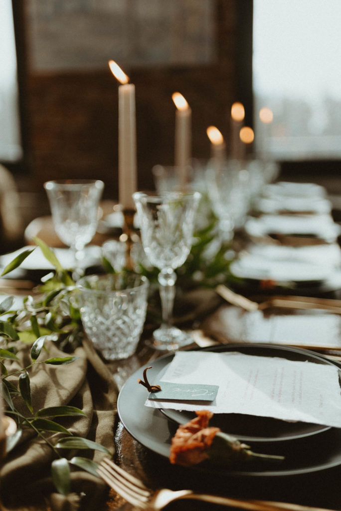 intimate elopement table setting with stationery and candles