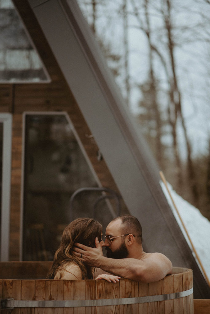 couple in cedar hot tub