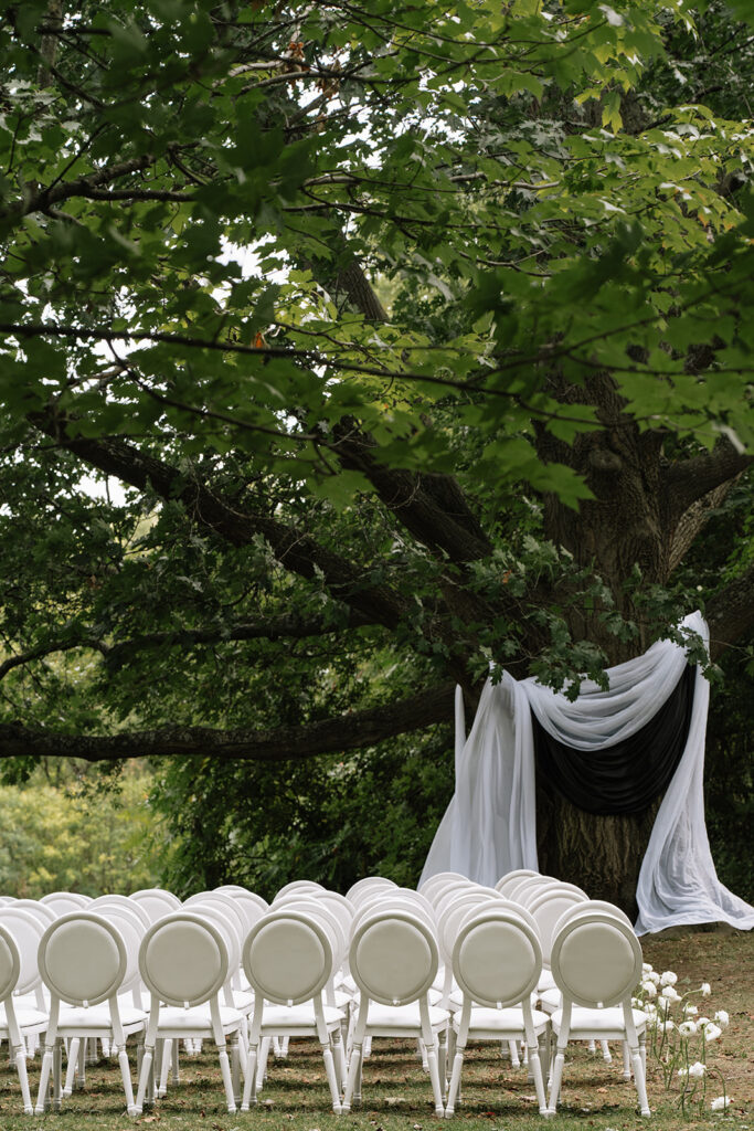 Monochromatic ceremony design by Ottawa wedding planner Sea and Silk Events