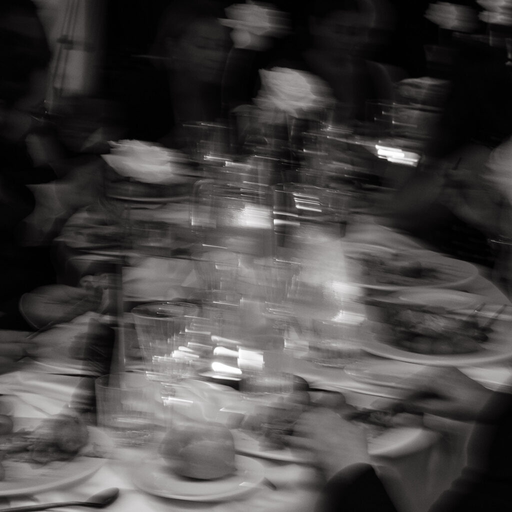 blurry black and white reception table