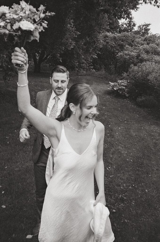 bride and groom celebrating on 35mm film