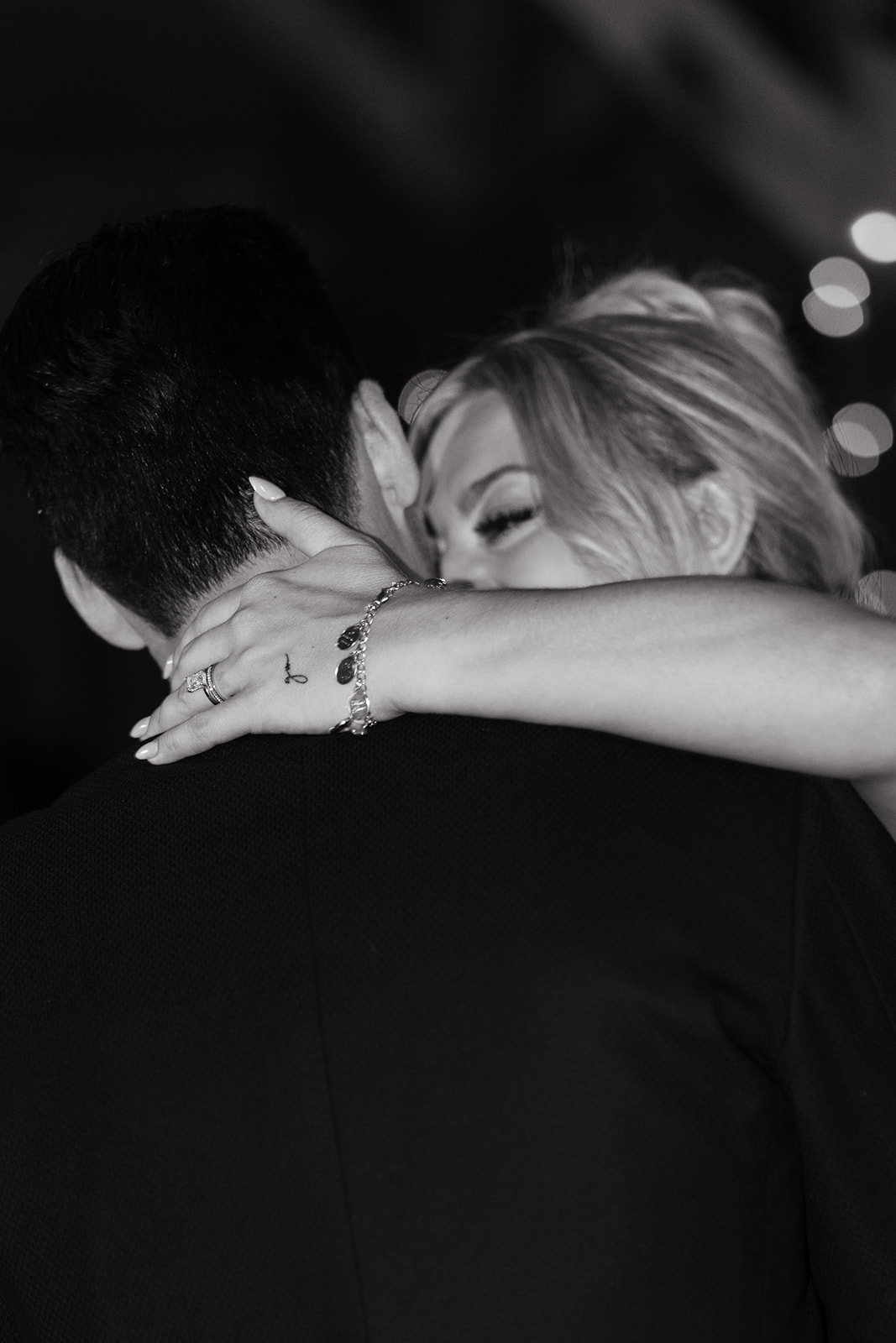 bride and groom dancing in low light during wedding reception